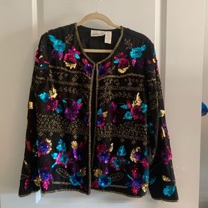 Vintage sequin jacket size XL. Shell 100% silk. Long sleeved, 25 inches long.